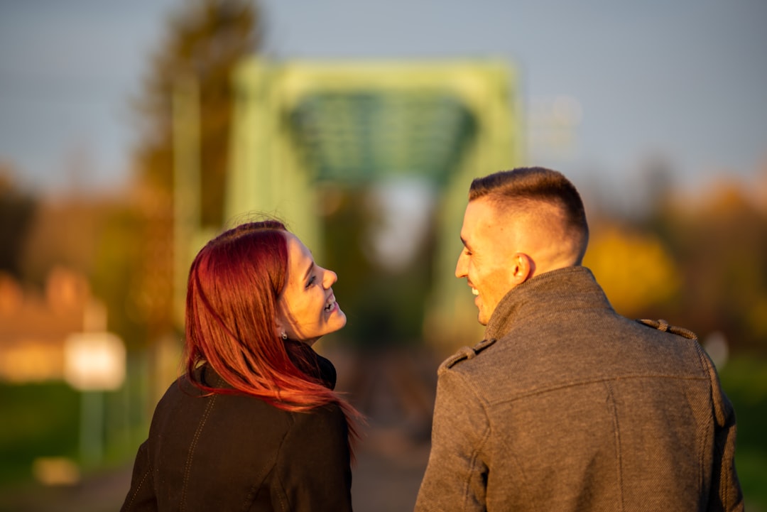 man-and-woman-standing-side-by-side-during-daytime-fkk8hg2tesk